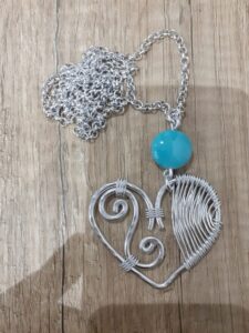collana pendente cuore e doppia spirale