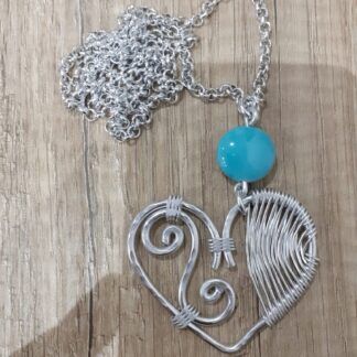 collana pendente cuore e doppia spirale