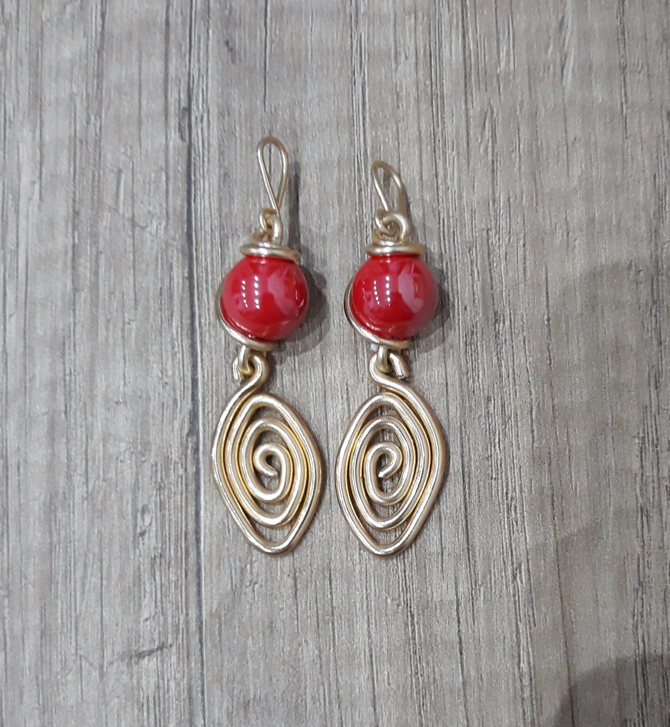 Orecchini - Zanghi collection Orecchini ovale dorati e pietre rosse
