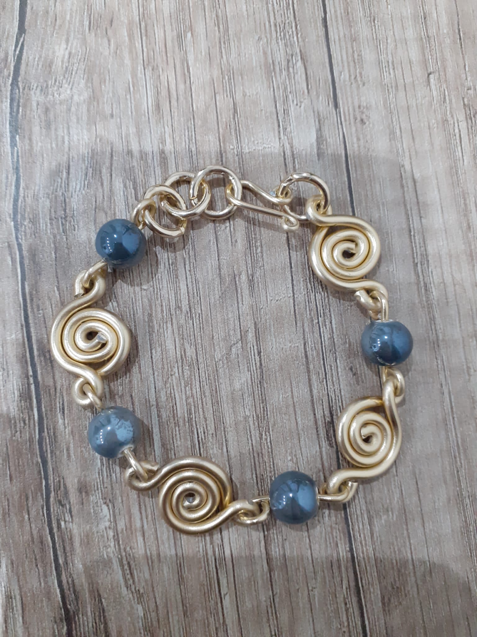 Bracciale dorato pietre scure gr12 - Zanghi collection Bracciale dorato pietre scure gr12