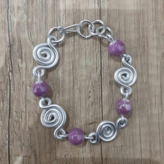 Bracciale spirali pietre lilla in ceramica