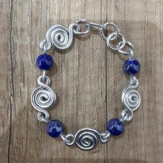 Bracciale spirali e pietre blu gr 12