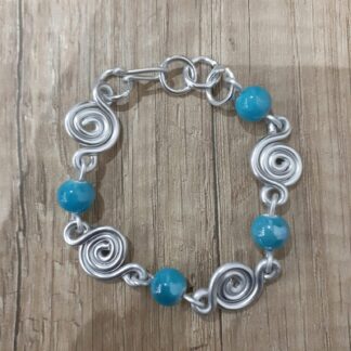 Bracciale spirali con pietre verde acqua in ceramica