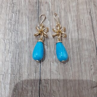 Orecchini stella e pietre a goccia azzurre in ceramica