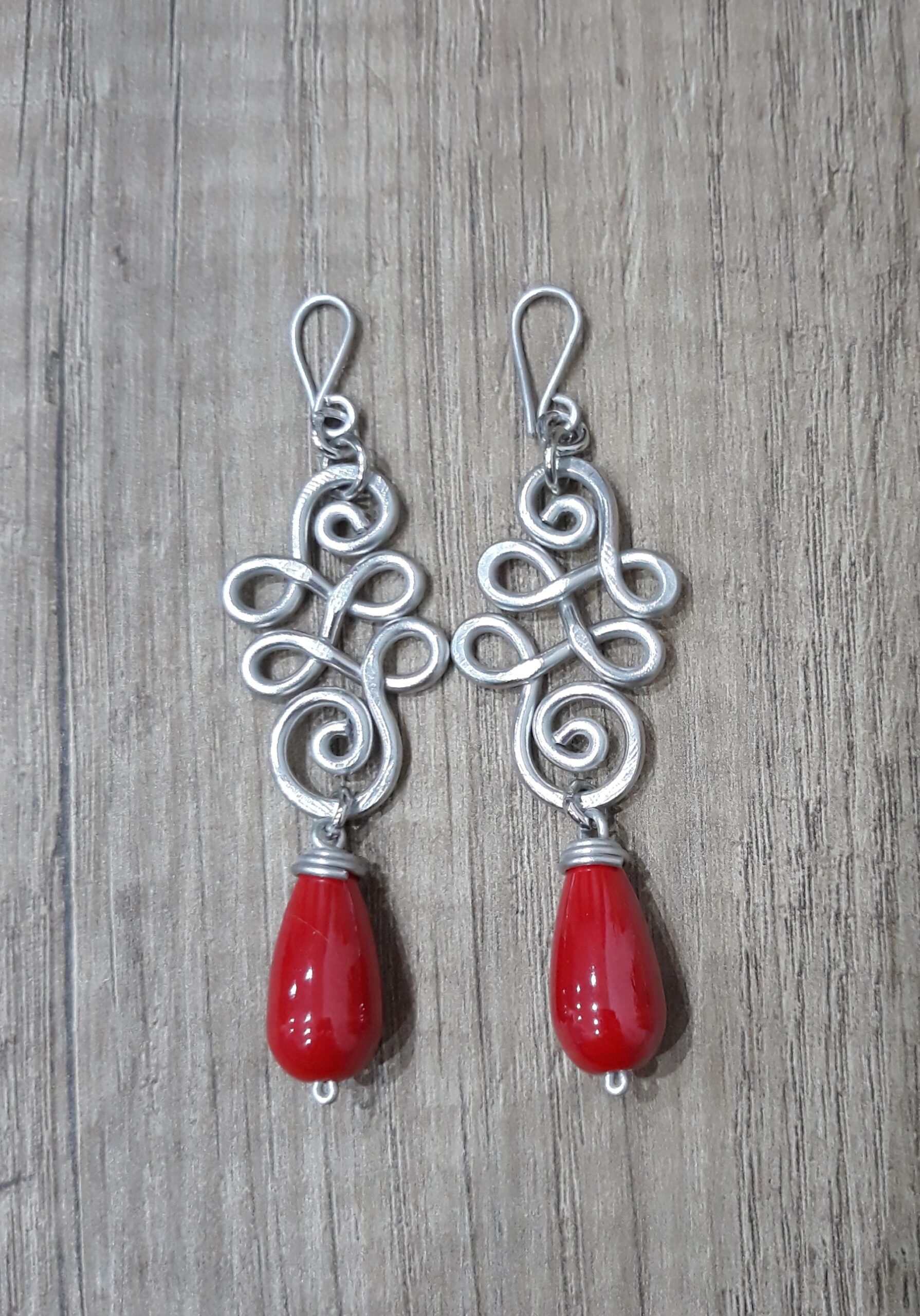 Orecchini doppia spirale con pietre rosse a goccia - Zanghi collection