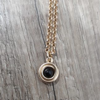 Collana artigianale spirale pietra nera