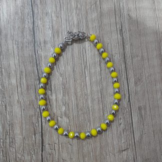 Bracciale artigianale con ematite e vetro giallo