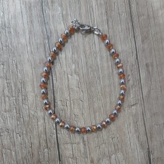 Bracciale artigianale con ematite e vetro sfaccettato